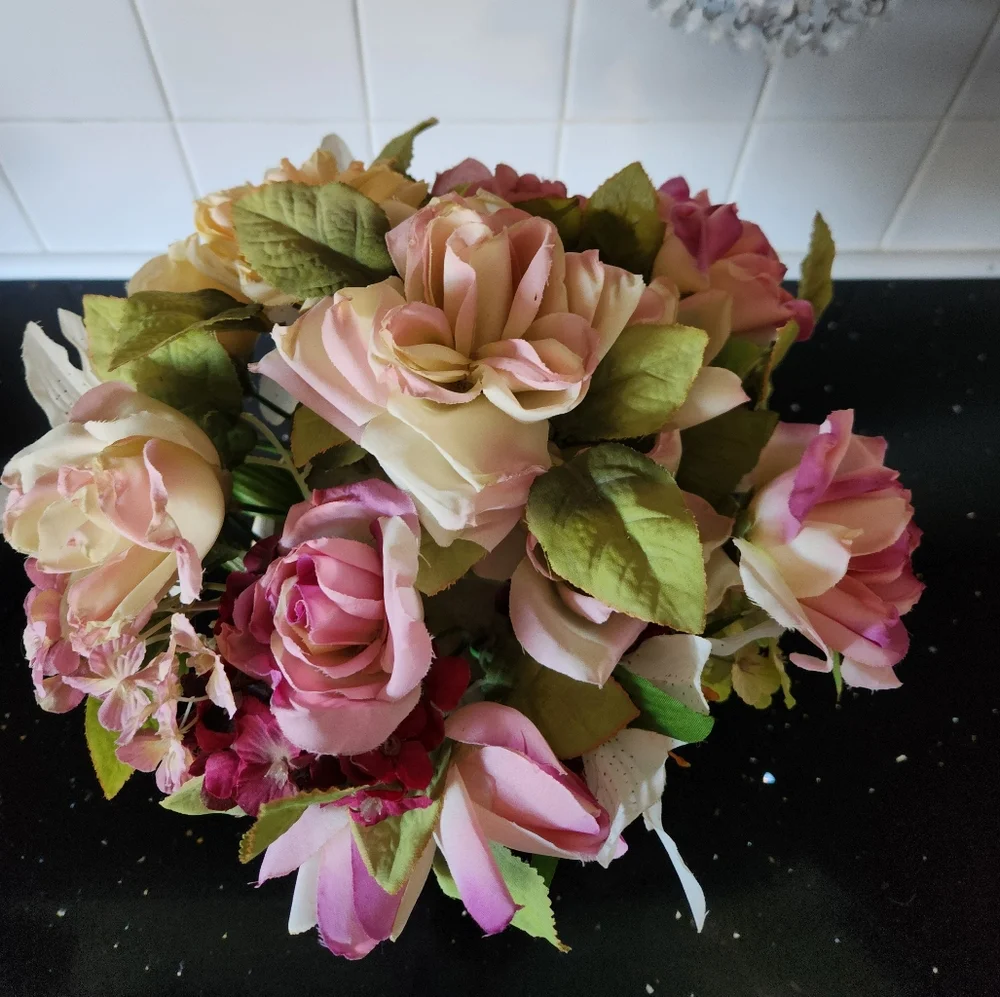 Beautiful faux flowers in vase